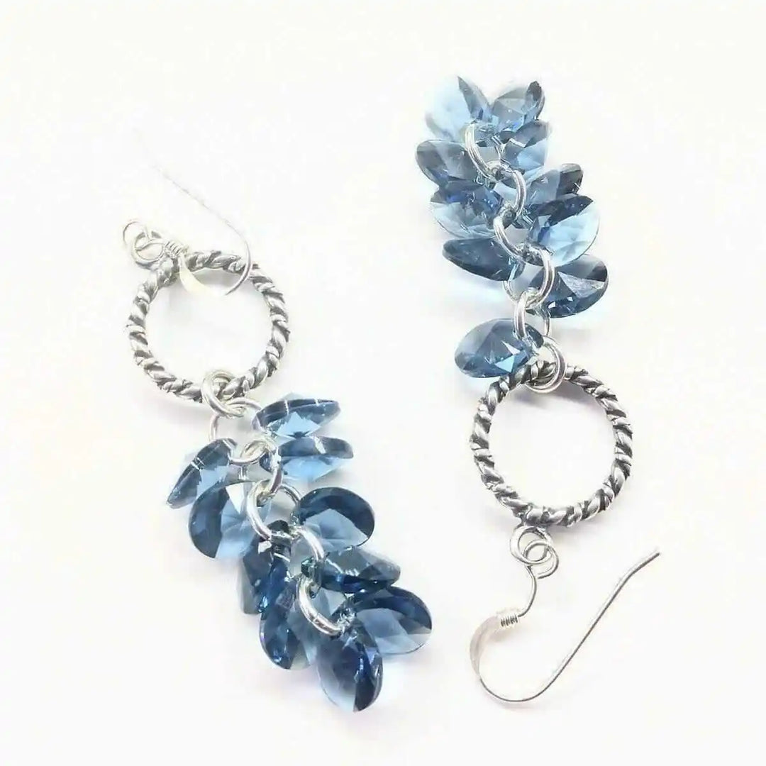 925 Silver Denim Blue Cascading Crystal Cluster Earrings showcasing a stunning cluster of blue crystals and elegant silver design.