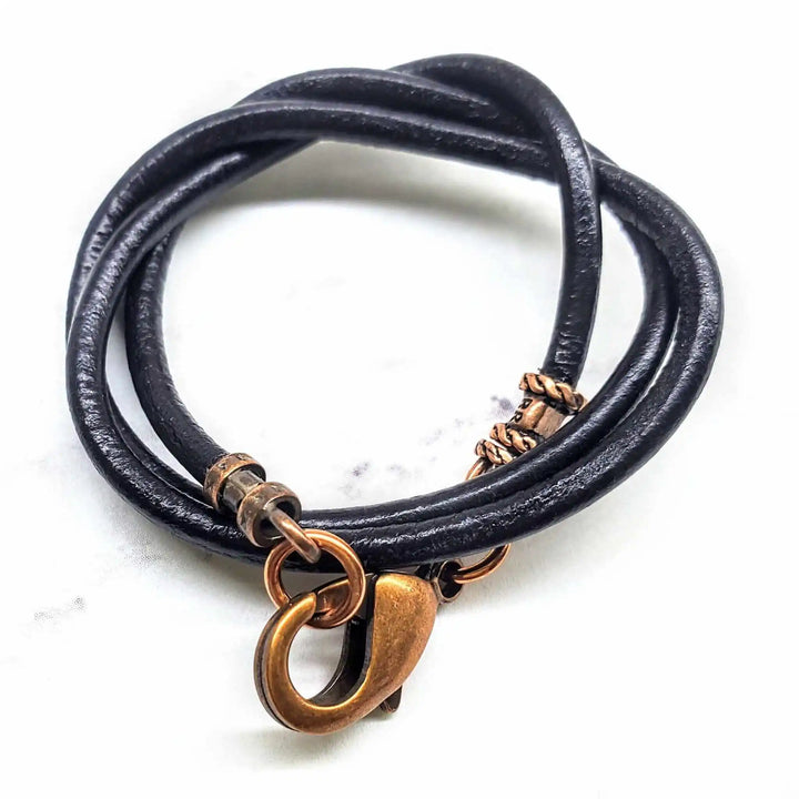 Handmade Various Lengths Smooth Black Leather Necklaces featuring a unique design with a bronze clasp.
