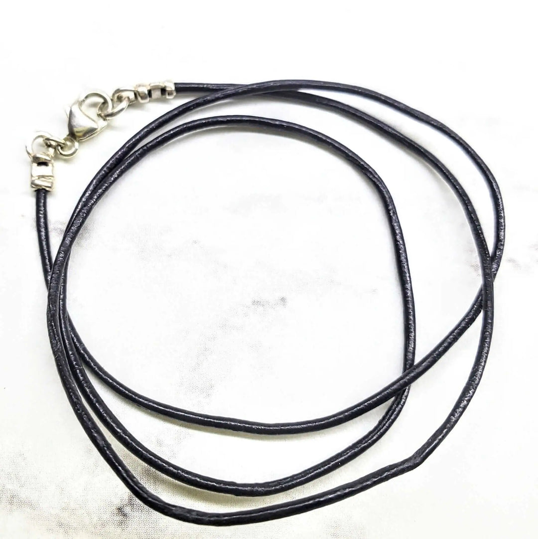 Handmade Various Lengths Smooth Black Leather Necklaces featuring multiple strands and a silver clasp.