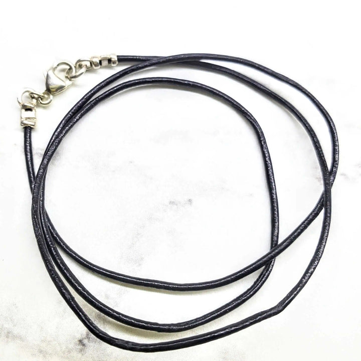 Handmade Various Lengths Smooth Black Leather Necklaces featuring multiple strands and a silver clasp.