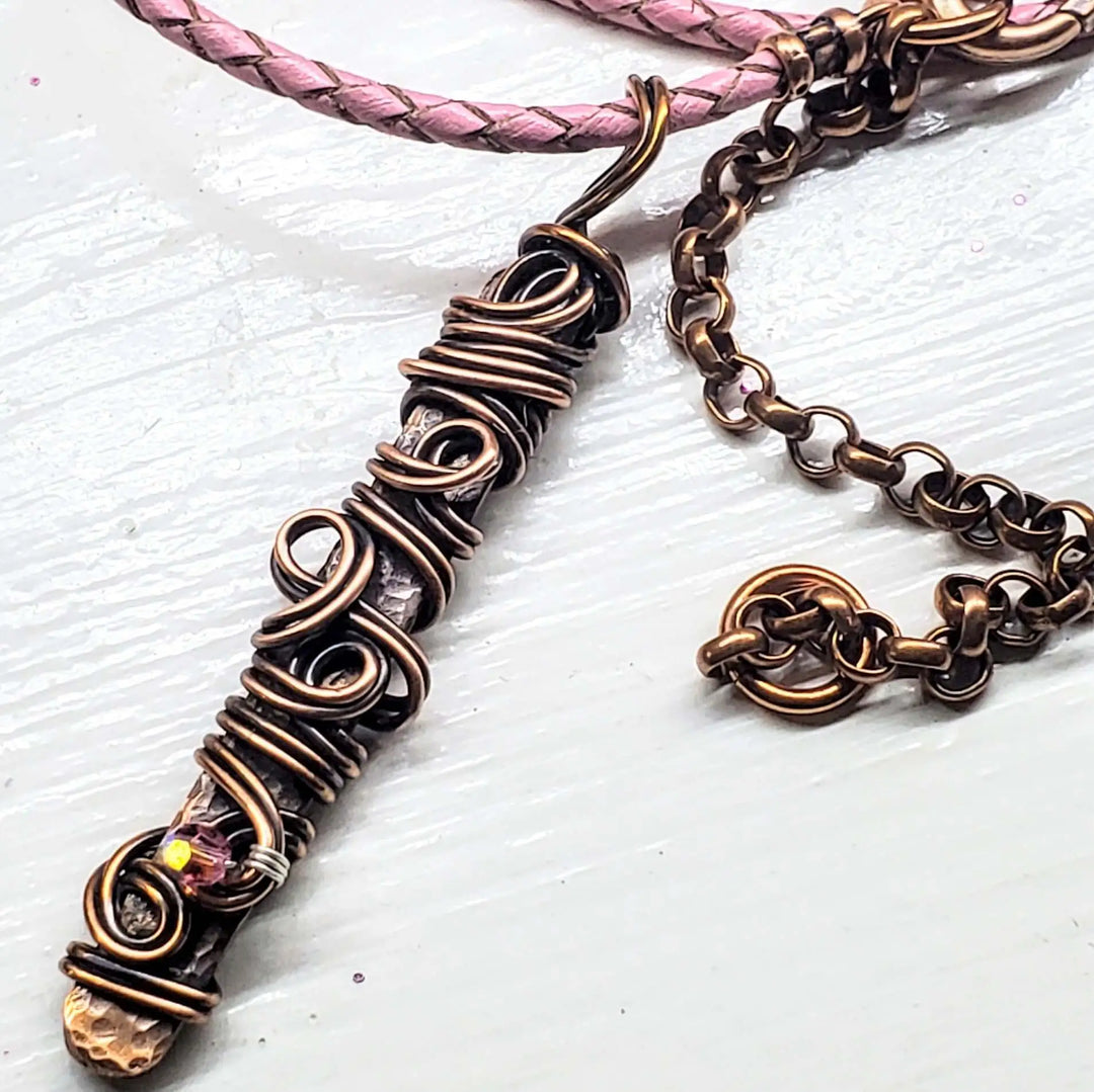 AMD1333Handmade Wire Sculpted Ribbon Pink Crystal Copper PendantNecklacesNecklace$ 61.00Alexa Martha Designs
