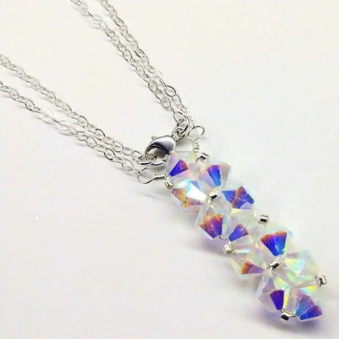 Handmade Wire Colored Woven Crystal Rock Candy Necklace featuring sparkling Swarovski crystal bicones on a silver chain.