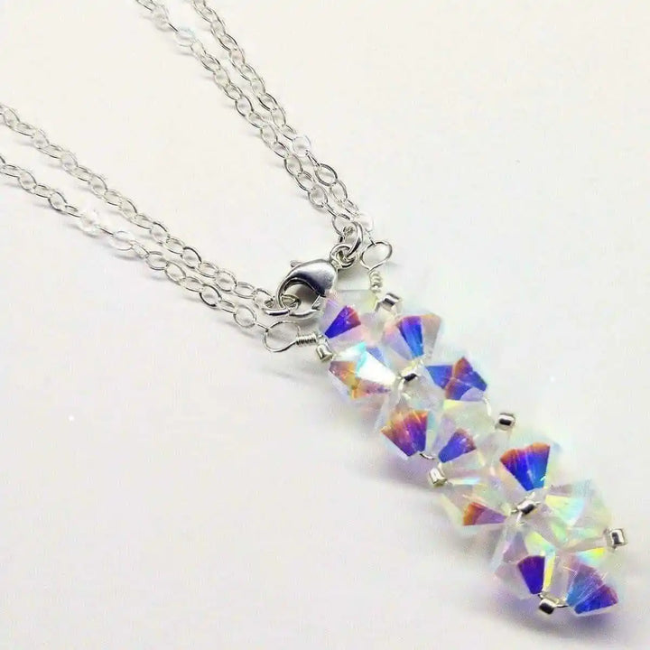 Handmade Wire Colored Woven Crystal Rock Candy Necklace featuring sparkling Swarovski crystal bicones on a silver chain.