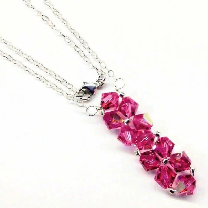 Handmade Wire Colored Woven Crystal Rock Candy Necklace featuring pink Swarovski crystal bicone pendant.