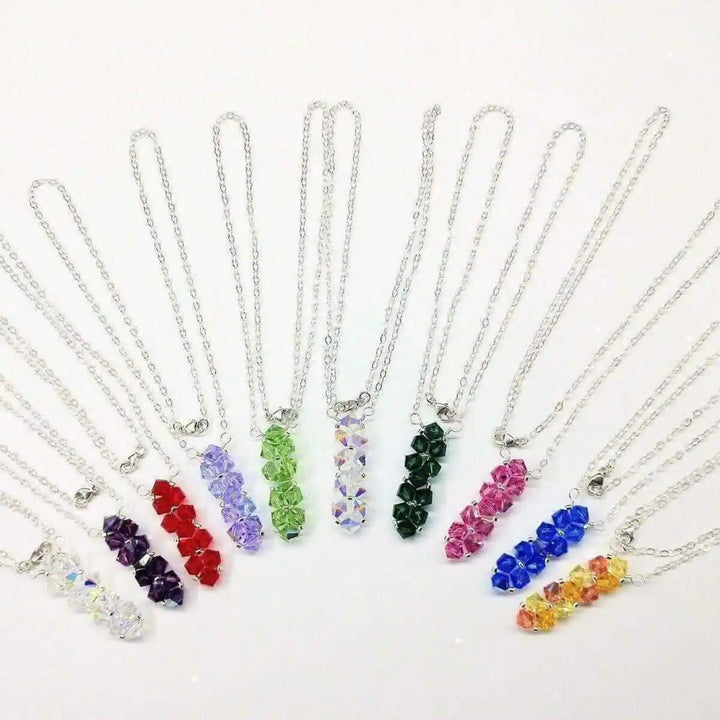 Handmade Wire Colored Woven Crystal Rock Candy Necklace showcased in various vibrant colors and styles.