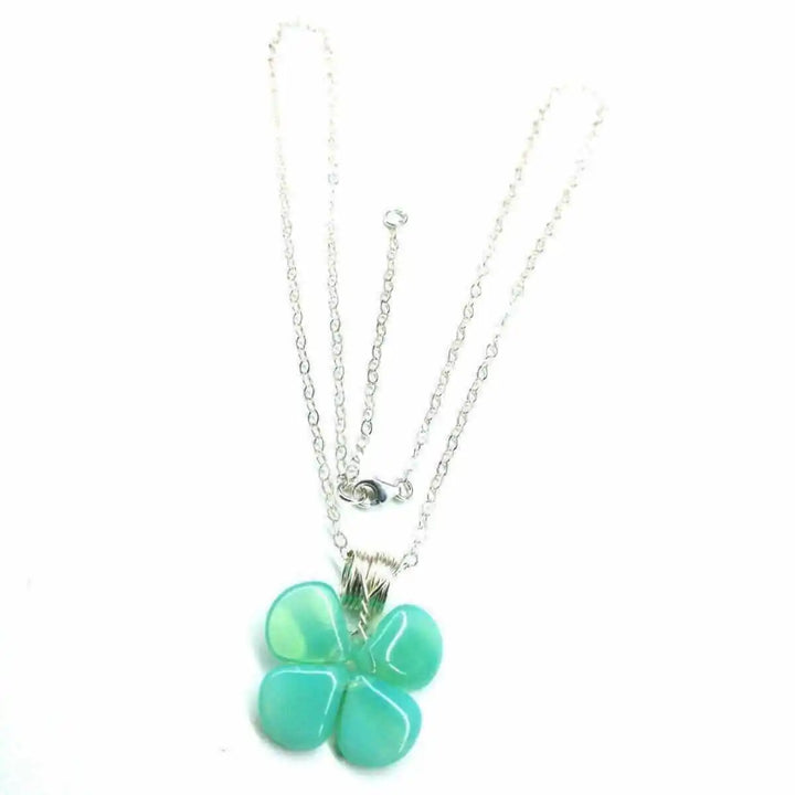 Mint green beaded clover necklace featuring Czech glass beads and sterling silver design.