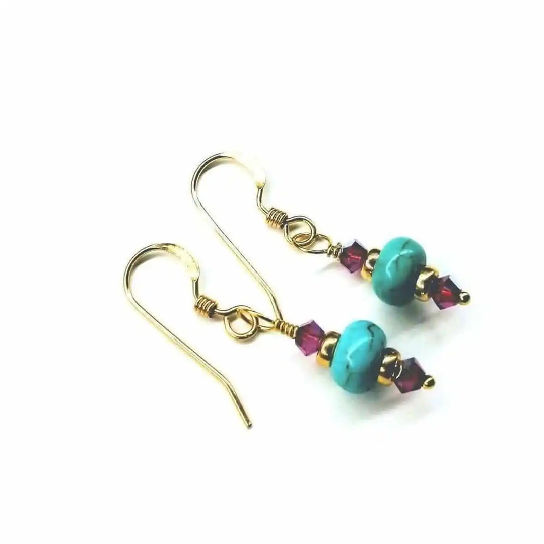 Hot Pink and Turquoise Gemstone14 K Gold Filled Earrings featuring turquoise gemstone roundels and hot pink Swarovski crystals.