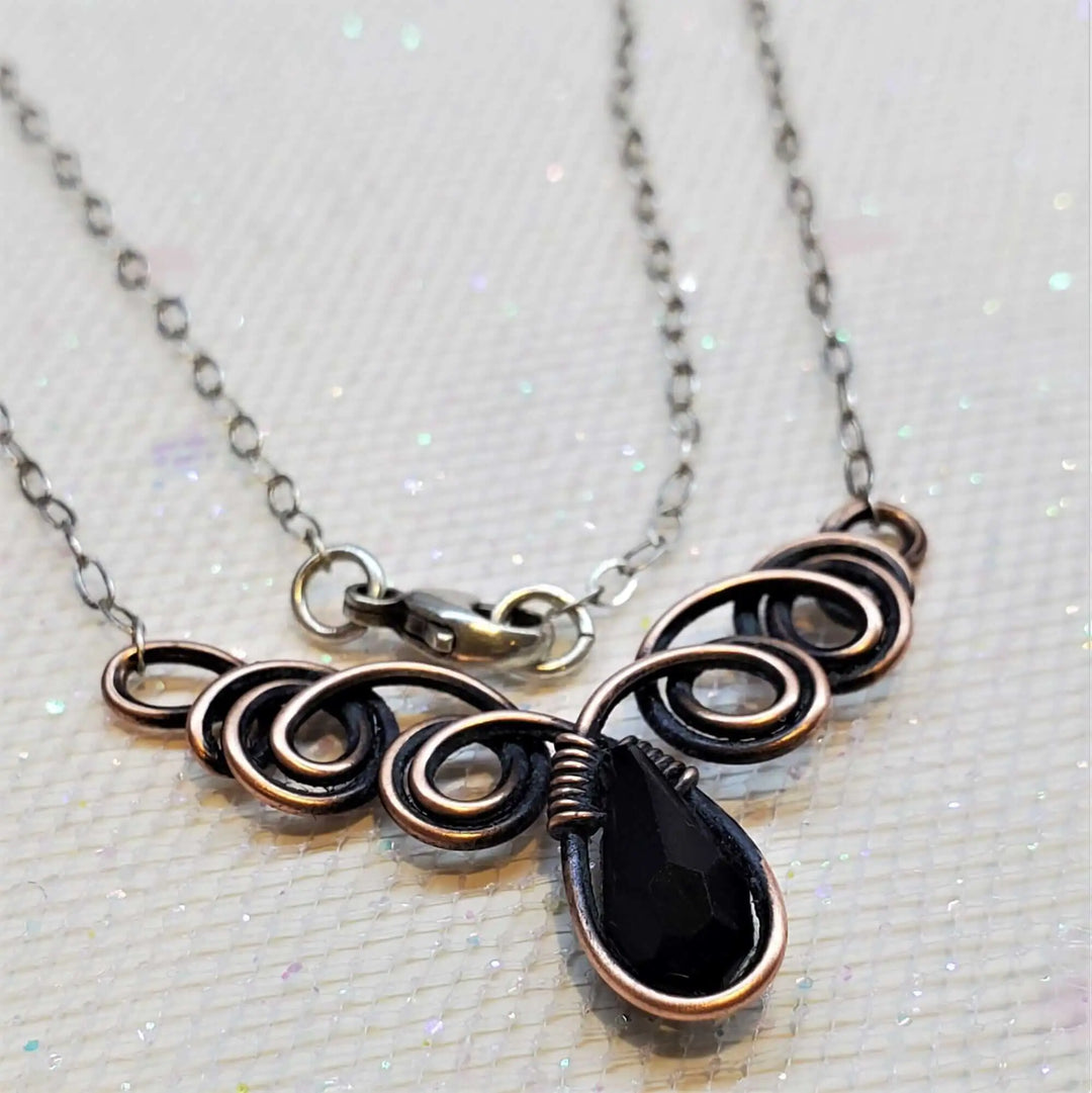 Class 1 Wire Sculpting Earrings Necklace Materials Kit featuring a wire sculpted necklace with black crystal pendant.