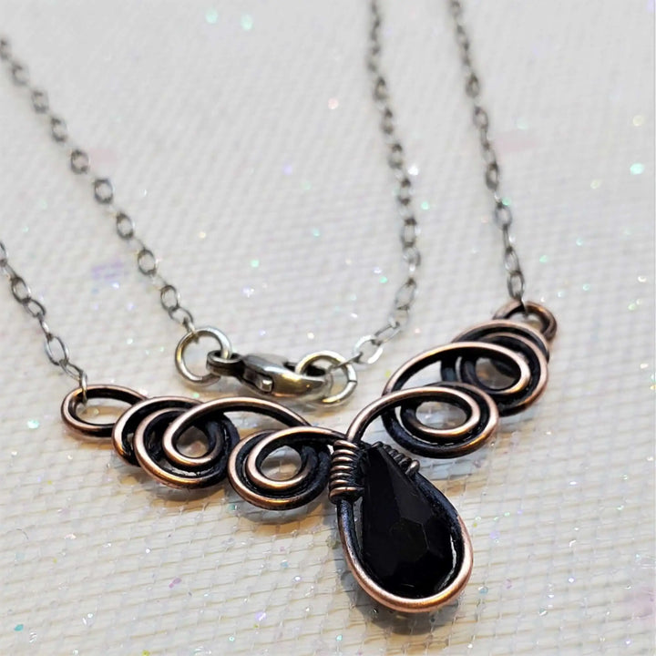 Class 1 Wire Sculpting Earrings Necklace Materials Kit featuring a wire sculpted necklace with black crystal pendant.