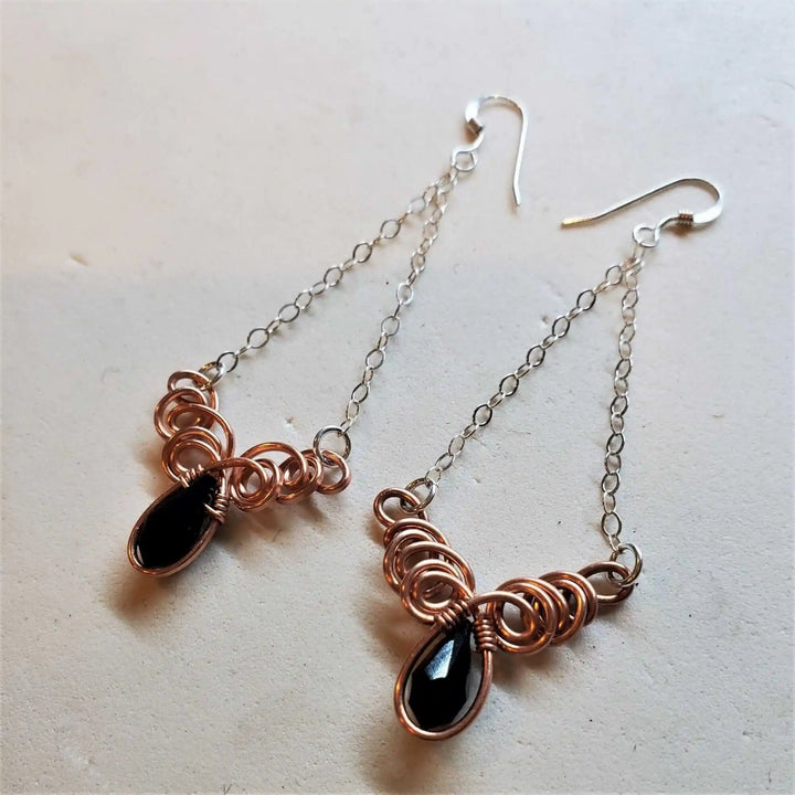 Class 1 Wire Sculpting Earrings Necklace Materials Kit featuring handcrafted wire earrings with black stone accents.