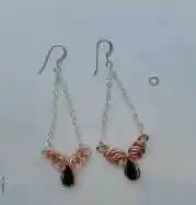 Class 1 Wire Sculpting Earrings Necklace Materials Kit showcasing handcrafted wire-sculpted earrings with crystals.