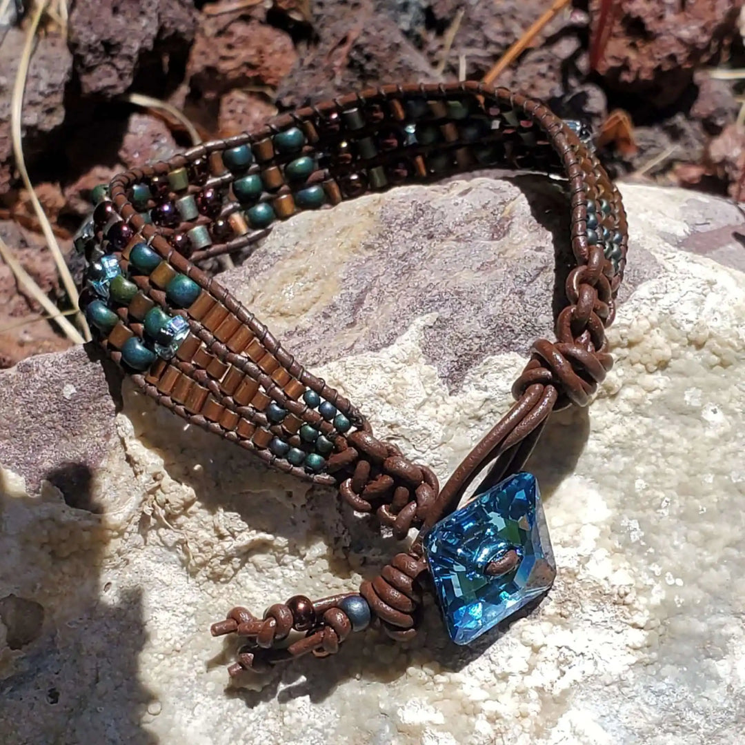 Intricate Bead Woven Swarovski Crystal Button Glam Bracelet with large aqua crystal and colorful bead design.