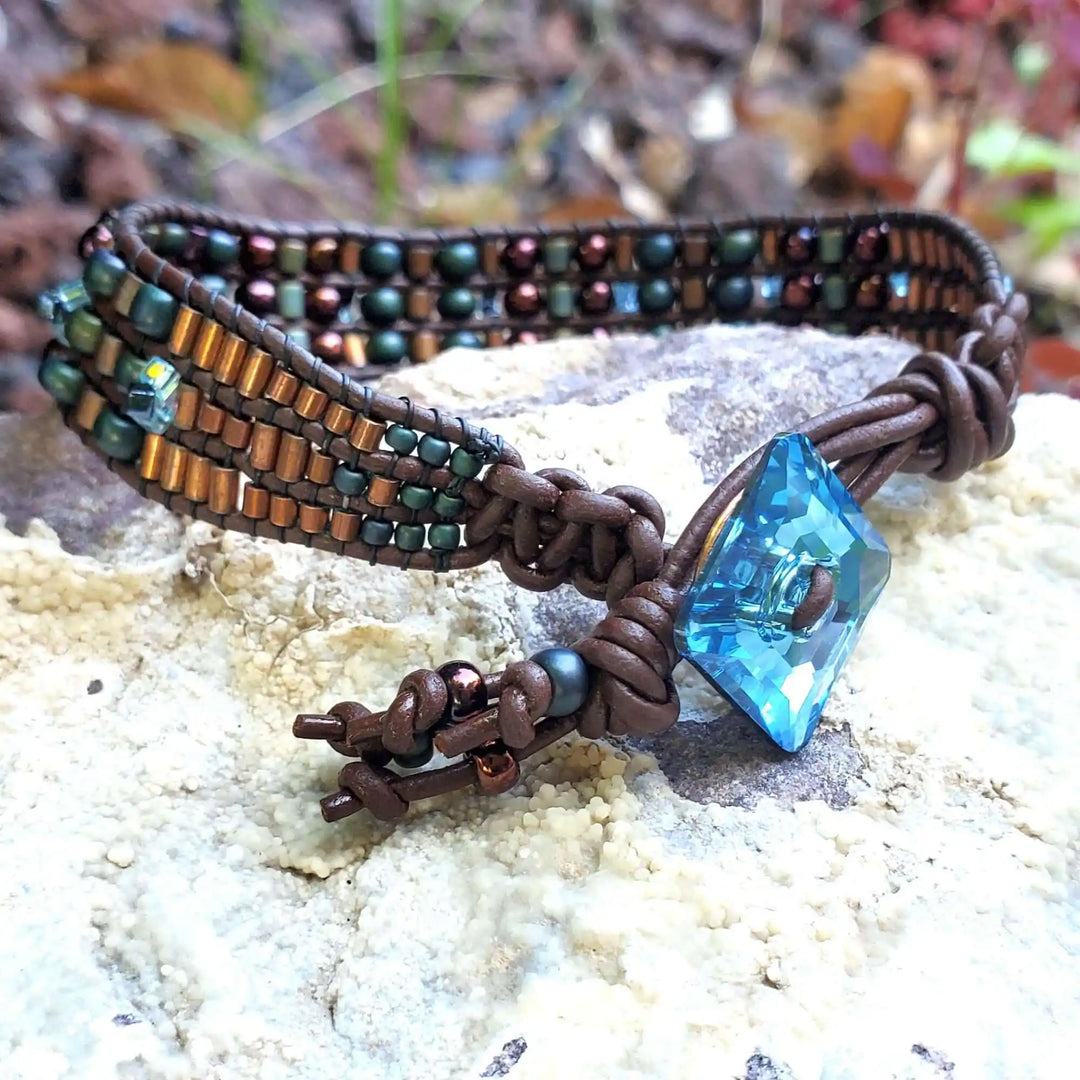 Intricate Bead Woven Swarovski Crystal Button Glam Bracelet featuring Aqua crystal and colorful Japanese glass beads