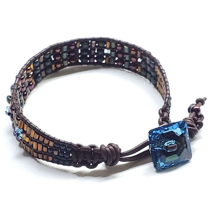 Intricate Bead Woven Swarovski Crystal Button Glam Bracelet showcasing colorful Japanese glass beads and Aqua crystal button.