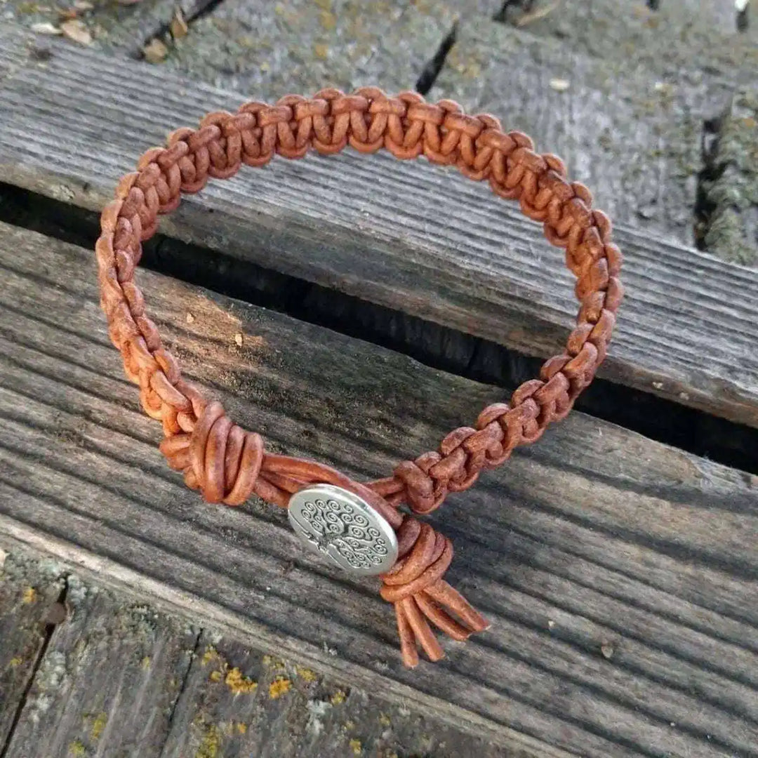 Large Mens Tree of Life Earth Color Macrame Leather Bracelet on wooden surface