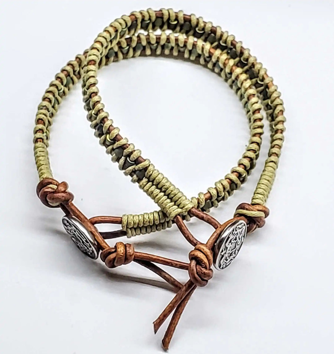 Leather Seed Bead Rattlesnake Tail Weave Bracelet showcasing intricate two-tone leather design.