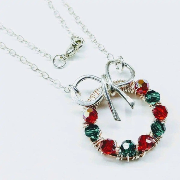 Red Green Crystal Christmas Wreath Necklace Special Edition showcasing red and green crystals with silver chain.