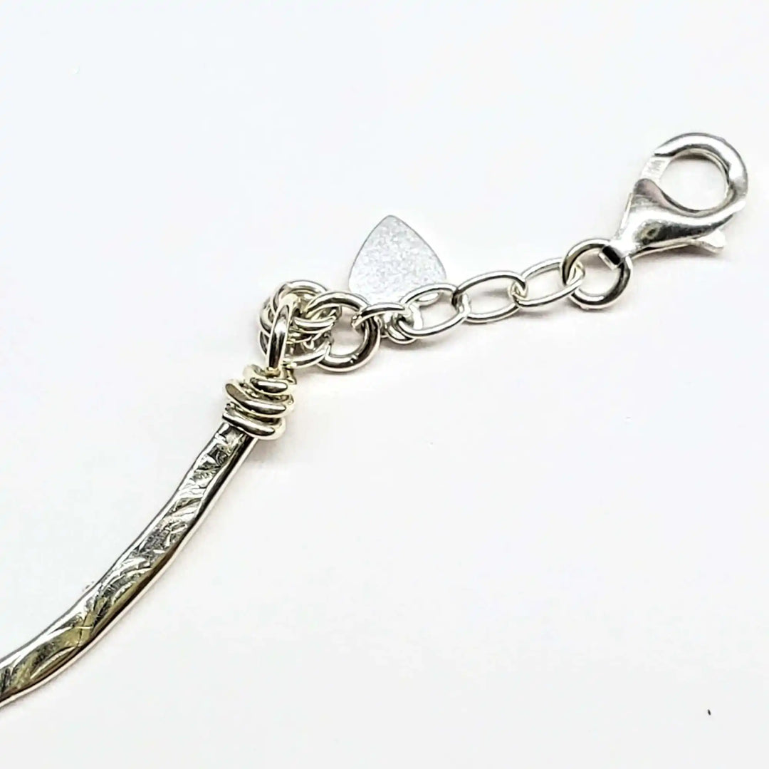 Close-up of the clasp and chain detail of the Limited Edition Red Green Christmas Holiday Tube Bracelet.