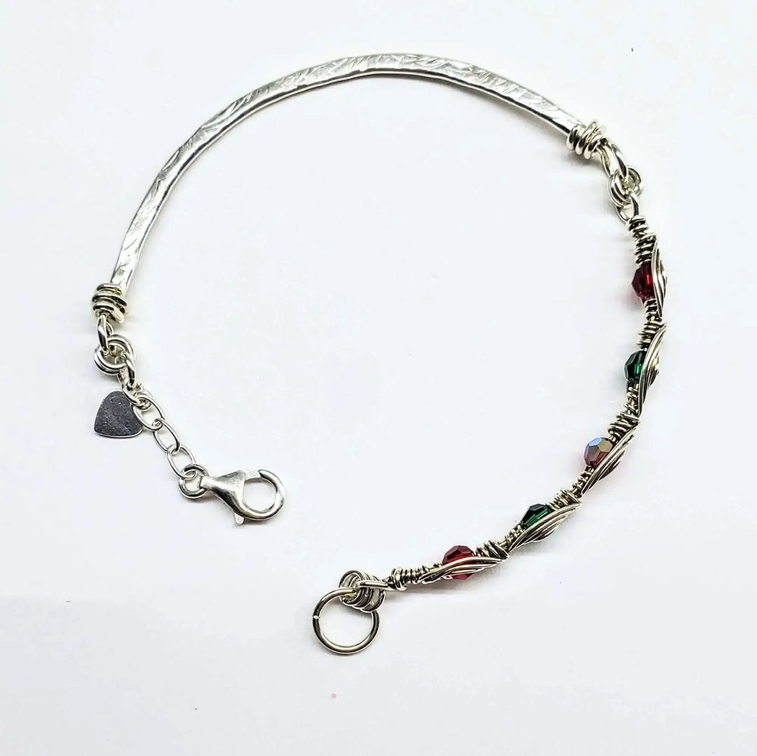 Limited Edition Red Green Christmas Holiday Tube Bracelet showcasing Swarovski crystals and intricate wirework.