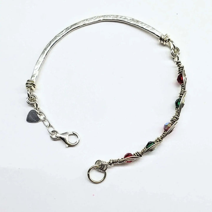 Limited Edition Red Green Christmas Holiday Tube Bracelet showcasing Swarovski crystals and intricate wirework.