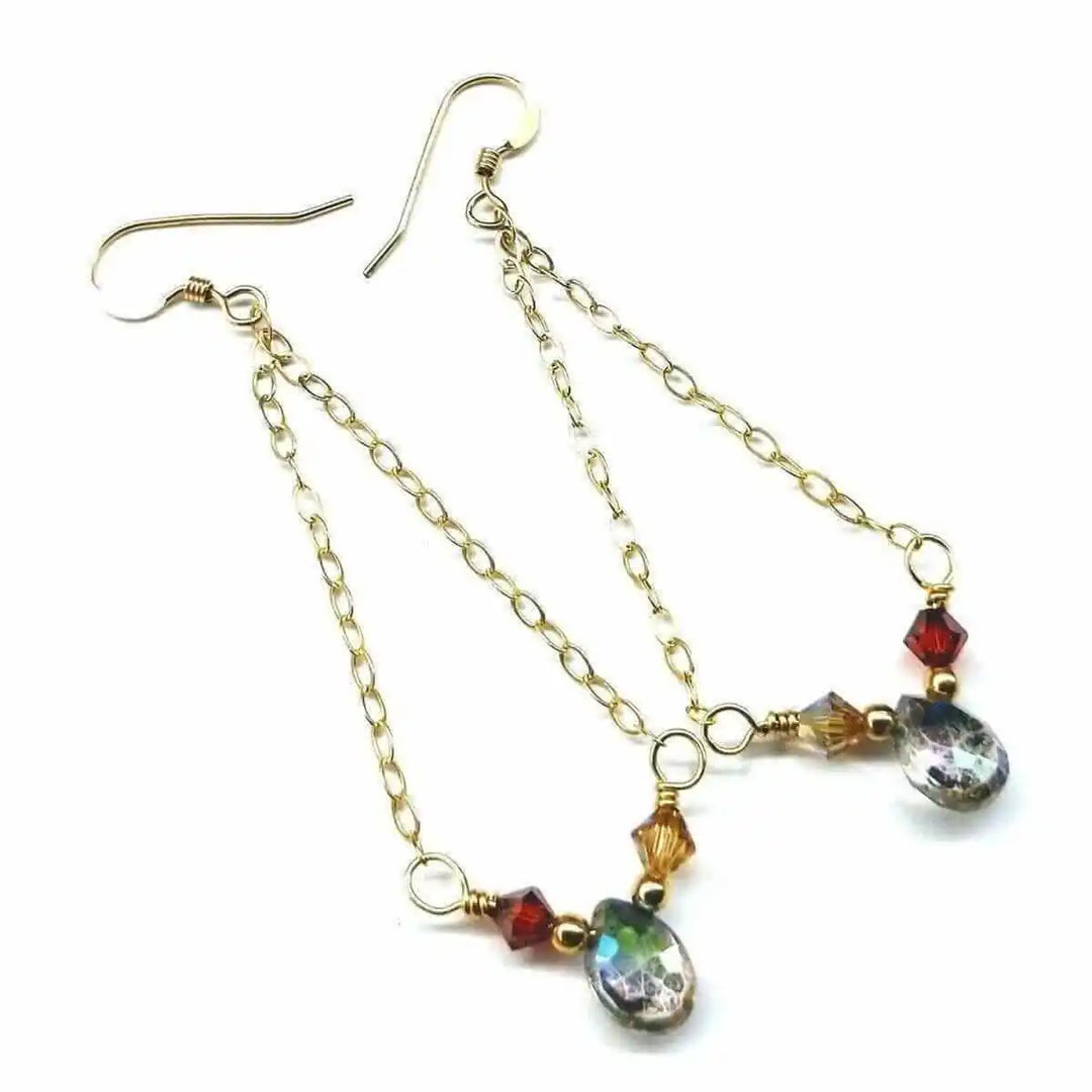 Mystic rainbow quartz drop gold filled earrings with sparkling gemstones and gold chains.