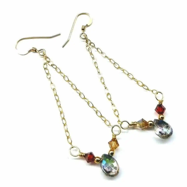 Mystic rainbow quartz drop gold filled earrings with sparkling gemstones and gold chains.