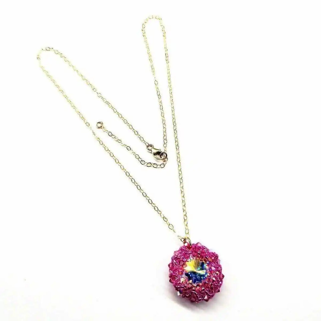 Pink Beaded Super Sparkly Rivoli Crystal Necklace with a vibrant pink crystal pendant and delicate gold chain.