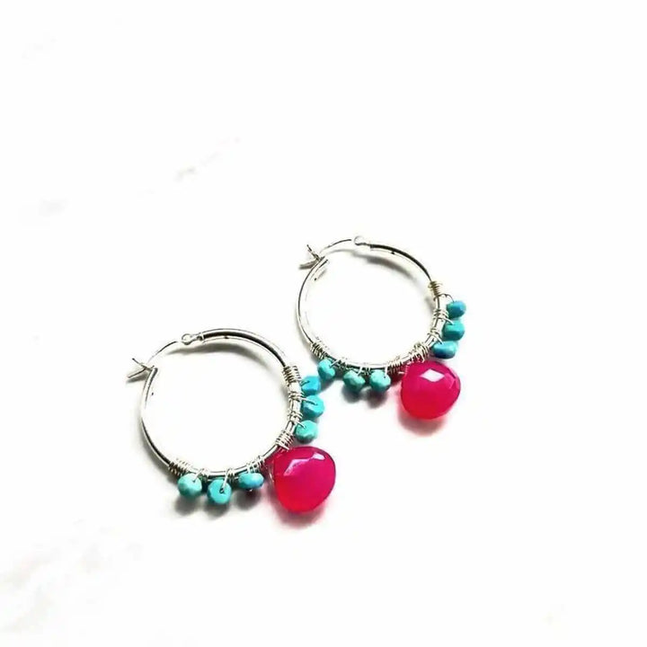 Pink and Sleeping Beauty Turquoise Silver Wire Hoop Earrings with vibrant pink and turquoise accents.