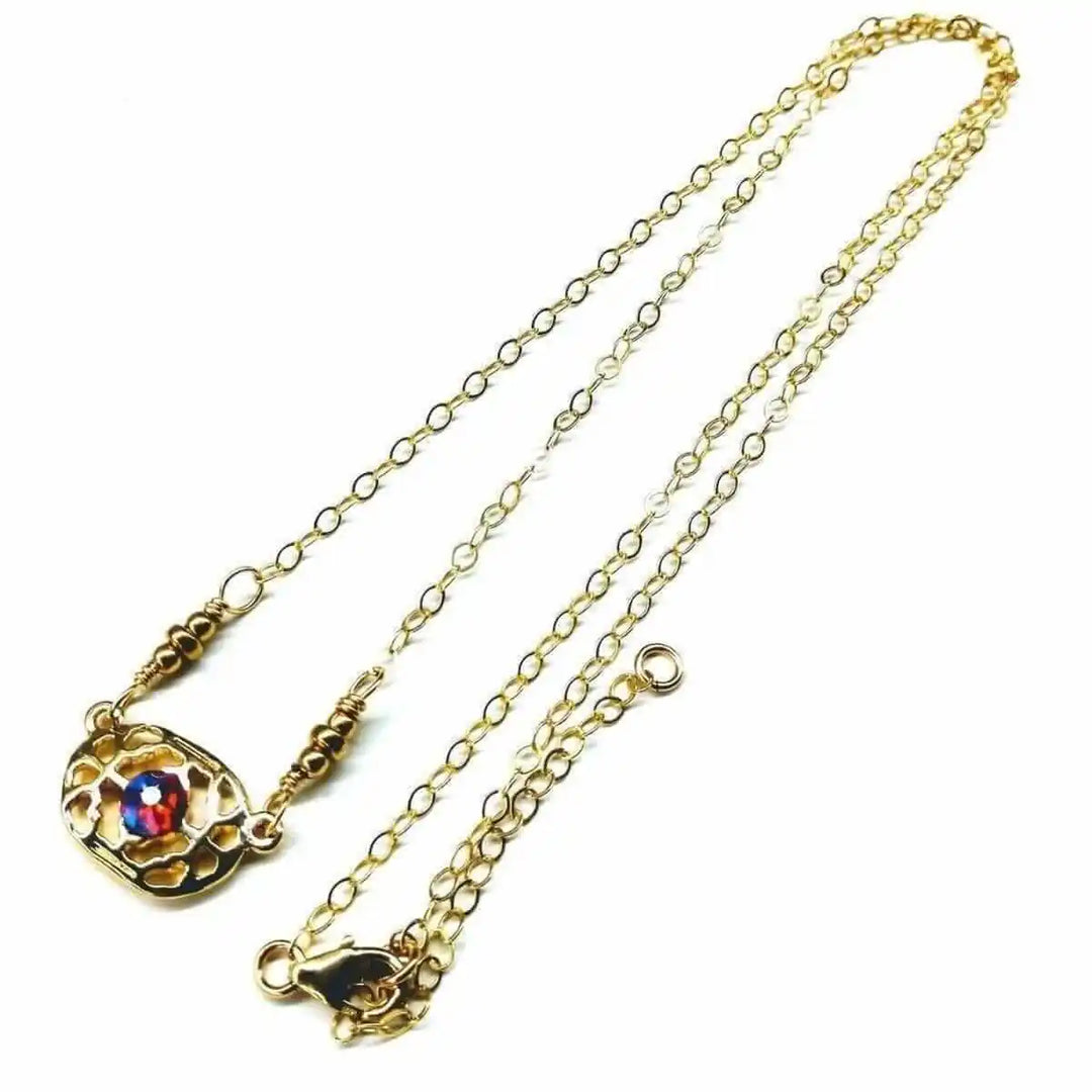 Red Crystal 14 K Gold Filled Adjustable Filigree Choker with shimmering red Swarovski crystal.