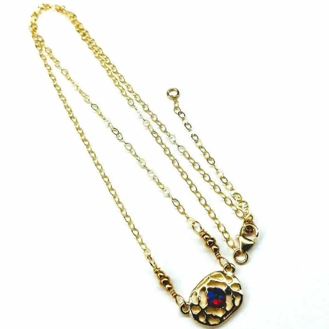 Red Crystal 14 K Gold Filled Adjustable Filigree Choker with shimmering crystals and elegant filigree design.