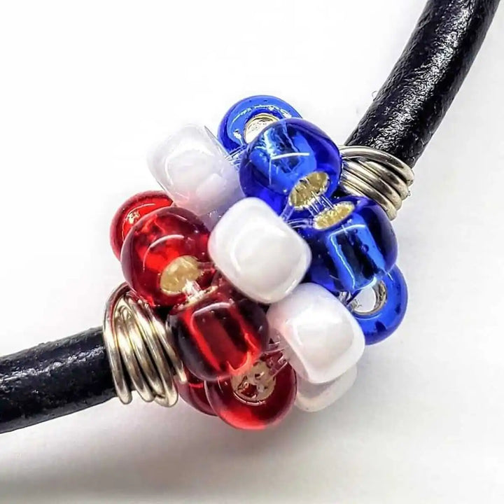 Patriotic Red White Blue Beaded Bead Leather Bracelet featuring vibrant red, white, and blue Swarovski beads.