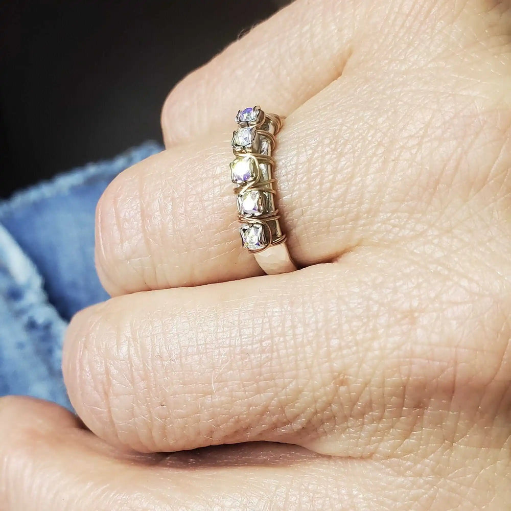 Rose Gold Filled Wire Wrapped Sparkly Crystal Bling Ring on a hand, showcasing its dazzling design and sparkling crystals.