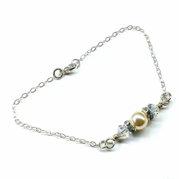 Silver Swarovski Crystal Pearl Bar Bridal Bracelet featuring elegant pearl and crystal accents on a delicate chain.