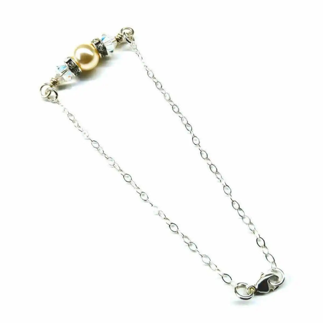 Silver Swarovski Crystal Pearl Bar Bridal Bracelet showcasing a pearl and crystals on a silver chain.