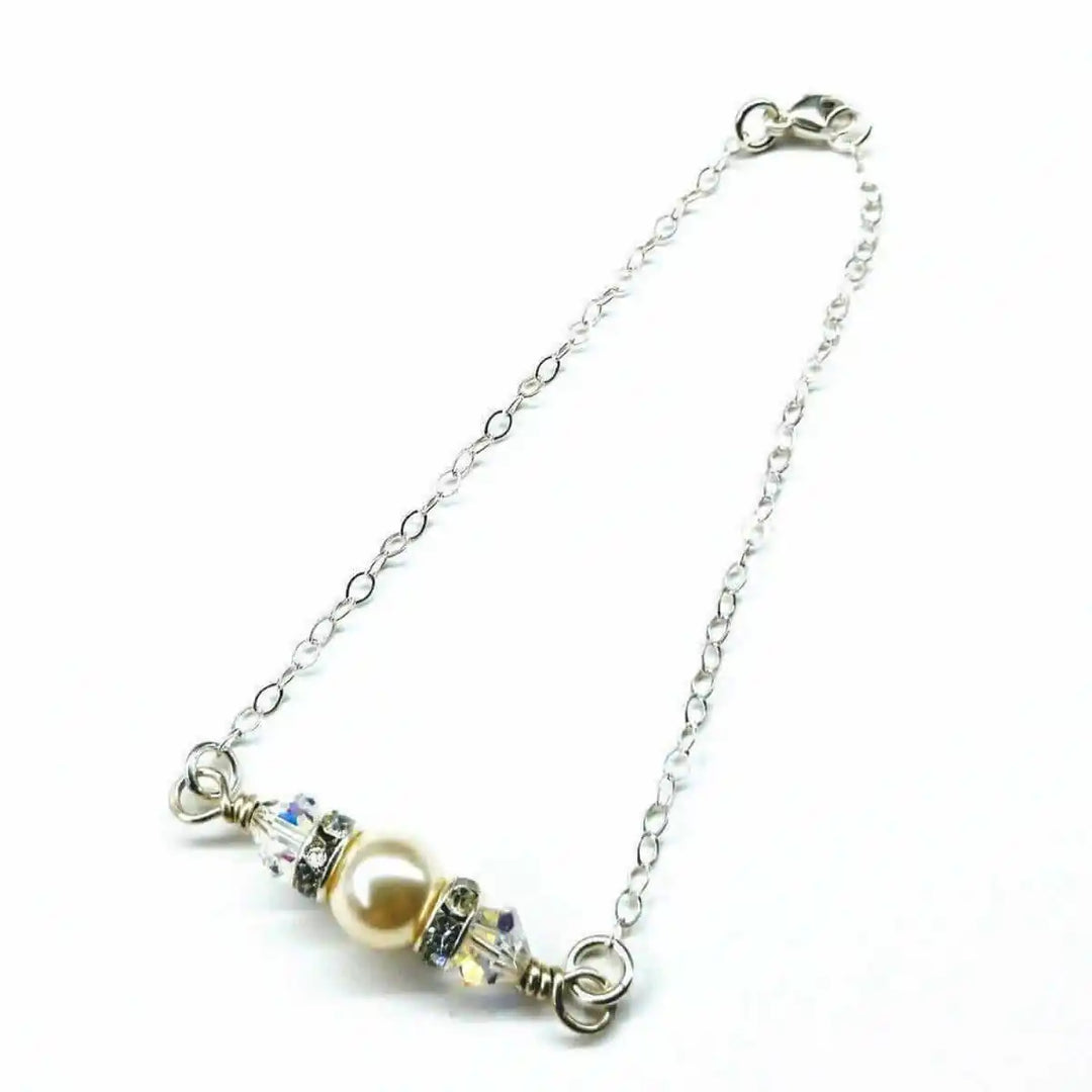 Silver Swarovski Crystal Pearl Bar Bridal Bracelet featuring elegant chain design with pearl and crystal accents.