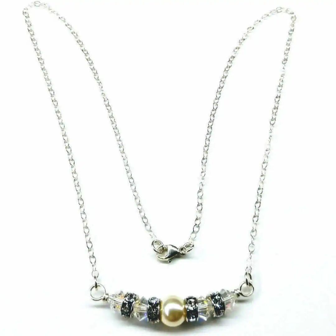 Silver Swarovski Crystal Pearl Bar Bridal Necklace features a stunning design with exquisite silver chain and pearls.