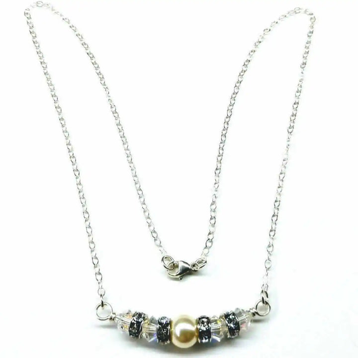 Silver Swarovski Crystal Pearl Bar Bridal Necklace features a stunning design with exquisite silver chain and pearls.