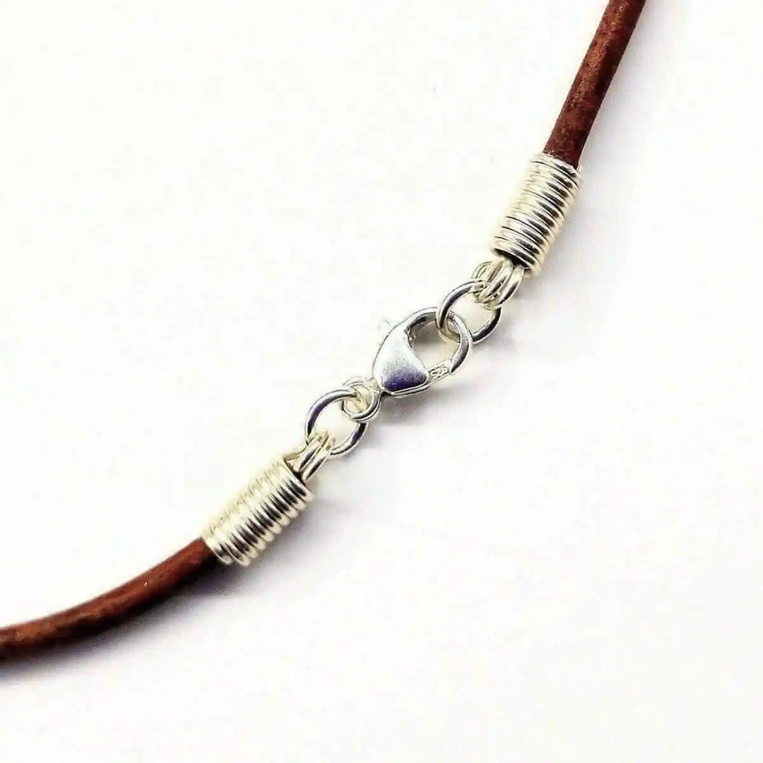 Handmade Silver Wire Wrapped Gemstone Crystal Point Pendant chain clasp detail with silver wire and brown leather.