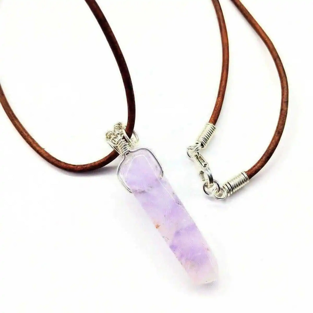 Silver Wrapped Light Amethyst Point Gemstone Necklace on a brown leather cord with a crystal pendant.