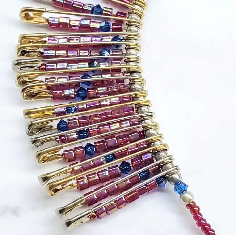 Handmade beaded Swarovski crystal zig zag bib choker necklace with colorful beads and golden safety pins.