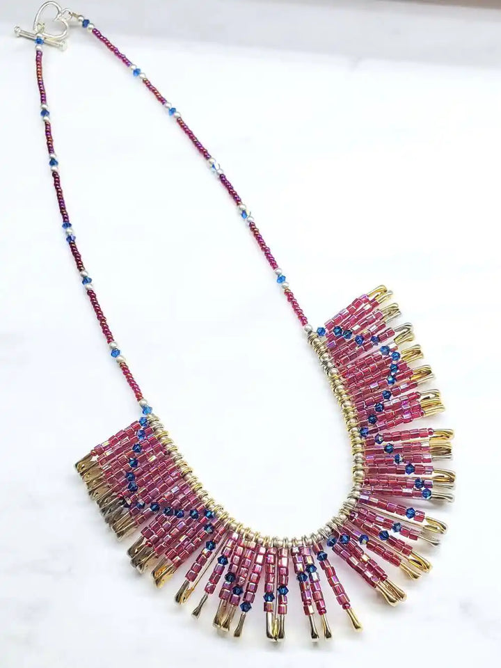 Handmade beaded Swarovski crystal zig zag bib choker necklace featuring bold colors and intricate design.