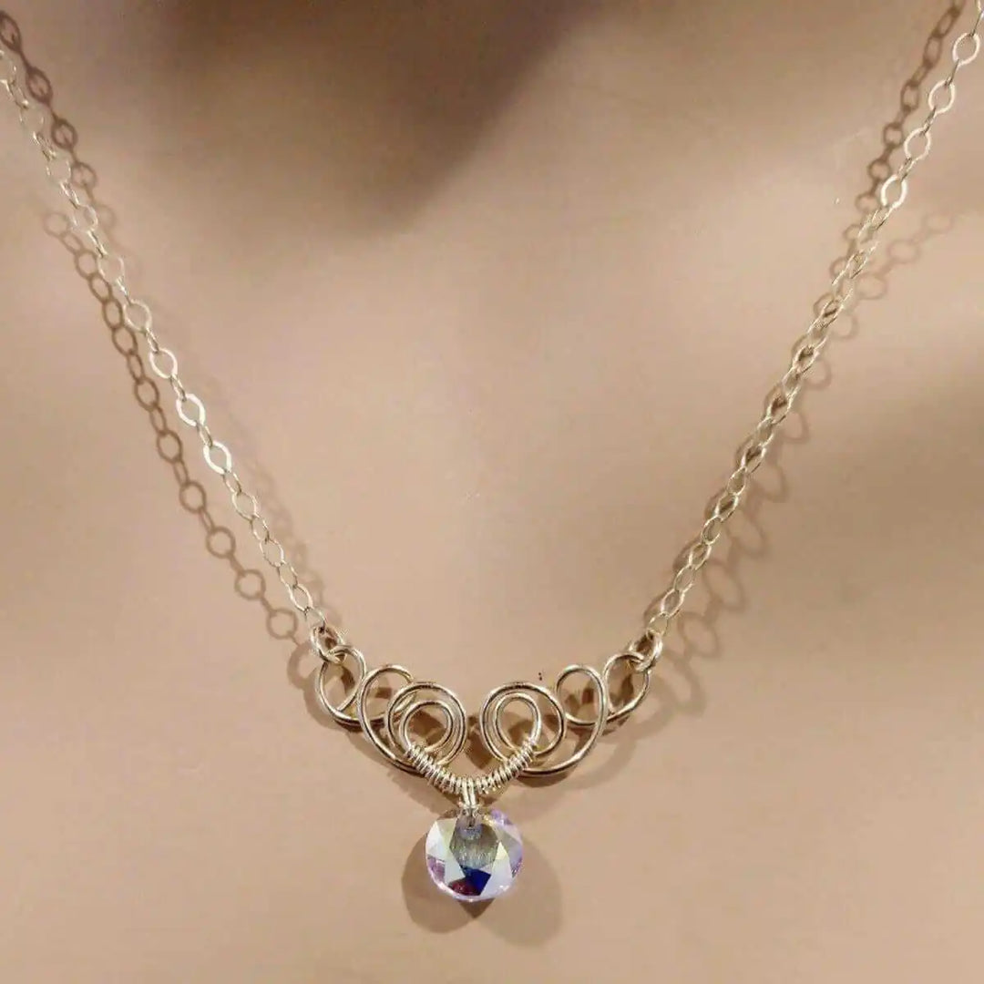 Sparkly Crystal AB Wire Sculpted 14 KT Gold Filled Necklace showcasing intricate wire design and crystal pendant.