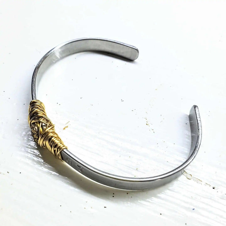 Stainless Steel LOVE Stamped Wire Wrapped Gold Druzy Cuff with delicate wire wrapping and durable band.