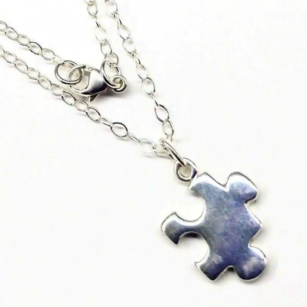 Sterling Silver Autism Awareness Puzzle Piece Chain Necklace featuring a hand-stamped puzzle piece pendant.