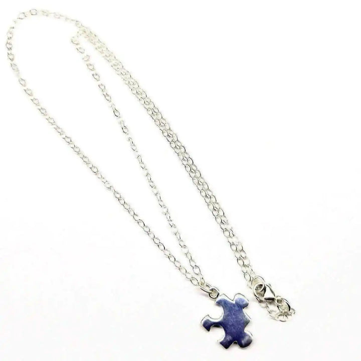 Sterling Silver Autism Awareness Puzzle Piece Chain Necklace featuring a handcrafted puzzle piece pendant on a delicate chain.