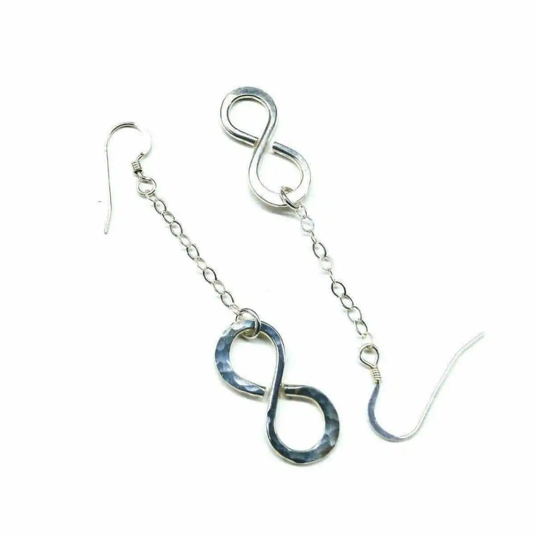 Sterling Silver Hammer Patterned Infinity Earrings with a unique handmade design and bold, shiny finish.