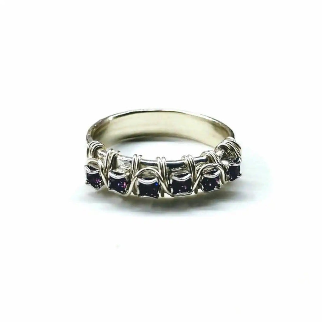 Sterling Silver Hammered Amethyst Rhinestone Bling Ring showcasing purple rhinestones and a unique hammered design.