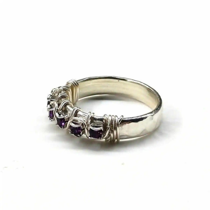 Sterling Silver Hammered Amethyst Rhinestone Bling Ring with purple rhinestones and a unique hammered design.