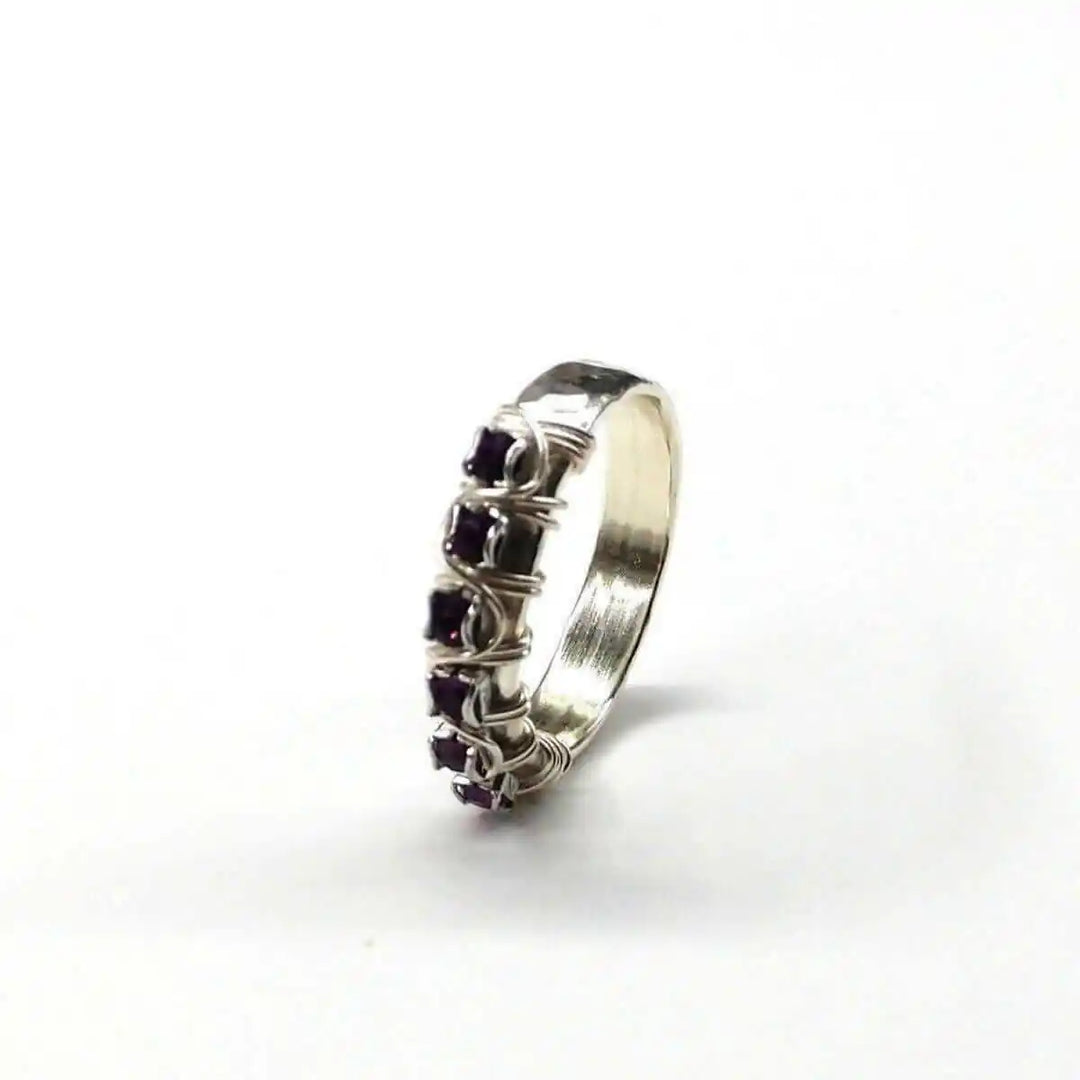 Sterling Silver Hammered Amethyst Rhinestone Bling Ring showcasing a beautiful cluster of amethyst stones in a handcrafted design.