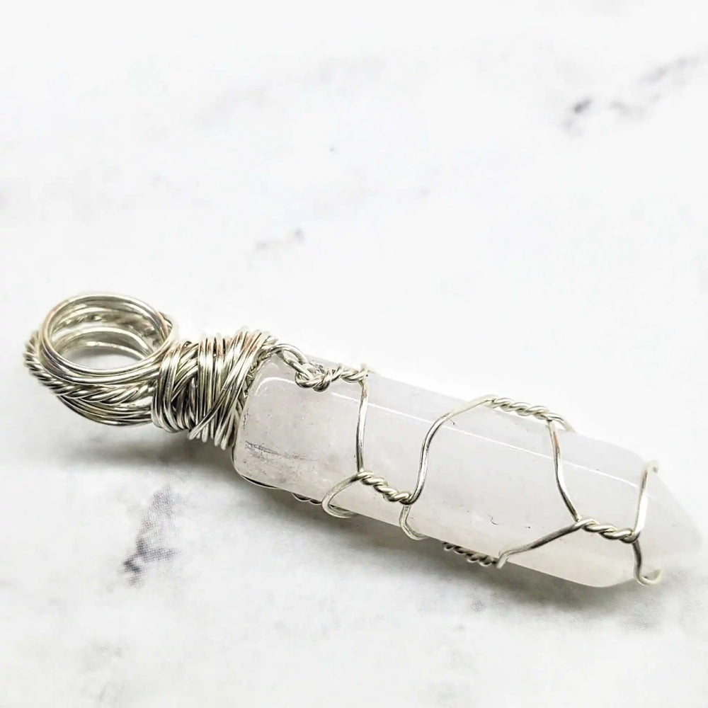Sterling Silver Messy Wire Wrap Gemstone Crystal Pendant showcasing its unique wire-wrapped design and clear crystal.